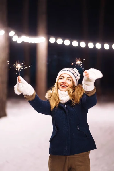 Cheerful Young Woman Holding Sparkler Hand Winter Forest Happy Cute — ストック写真