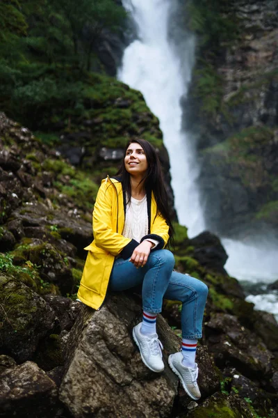 Girl Tourist Yellow Jacket Enjoys Freedom Backdrop Waterfall Young Woman — Stock Photo, Image