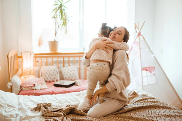 Beautiful Young Woman Her Charming Little Daughter Hugging Smiling Mother — Stock Photo, Image