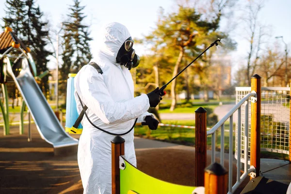 Man Wearing Protective Suit Disinfecting Playground Sun Spray Chemicals Preventing — Stock Photo, Image