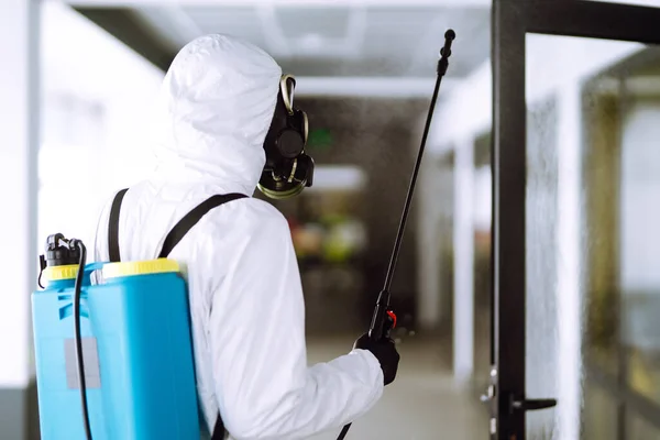 Disinfecting Office Prevent Covid Man Protective Hazmat Suit Spray Chemicals — Stock Photo, Image