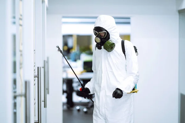 Disinfecting Office Prevent Covid Man Protective Hazmat Suit Spray Chemicals — Stock Photo, Image