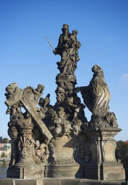 historical sculptures on a Charles Bridge in Prague