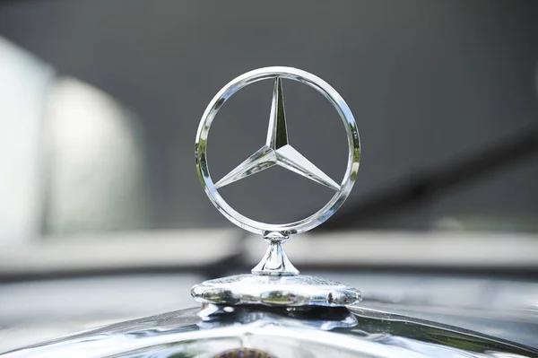 car design details, luxury expensive shiny car symbol Mercedes 