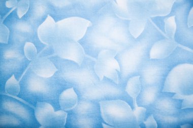 Mavi çiçek desenli polyester kumaş.