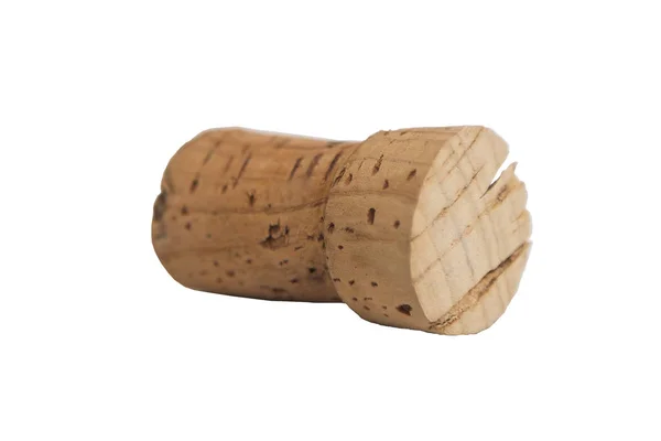 Un pequeño corcho de vino de madera viejo sobre fondo blanco aislado . — Foto de Stock