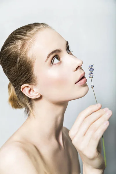 Portrait of young blonde beautiful girl with lavender in hand — Stock Photo, Image
