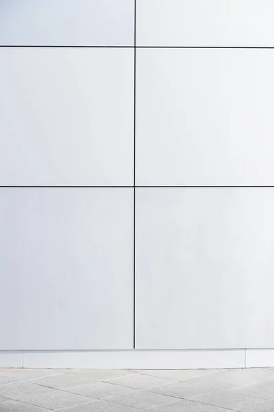 modern minimalistic geometric wall of metal or plastic square blocks