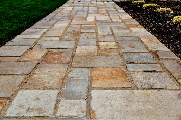 Stones to decorate as a walkway.Rock floor on long straight back — Stock Photo, Image