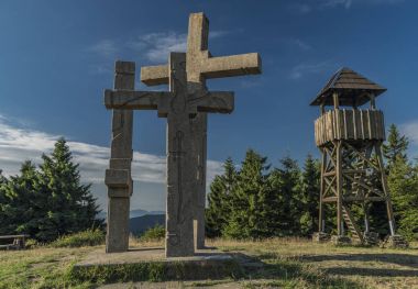 On hill Stratenec with crosses and observation tower clipart