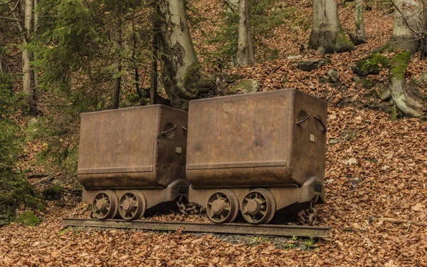 Mine carts near Cerny Dul village in autumn day