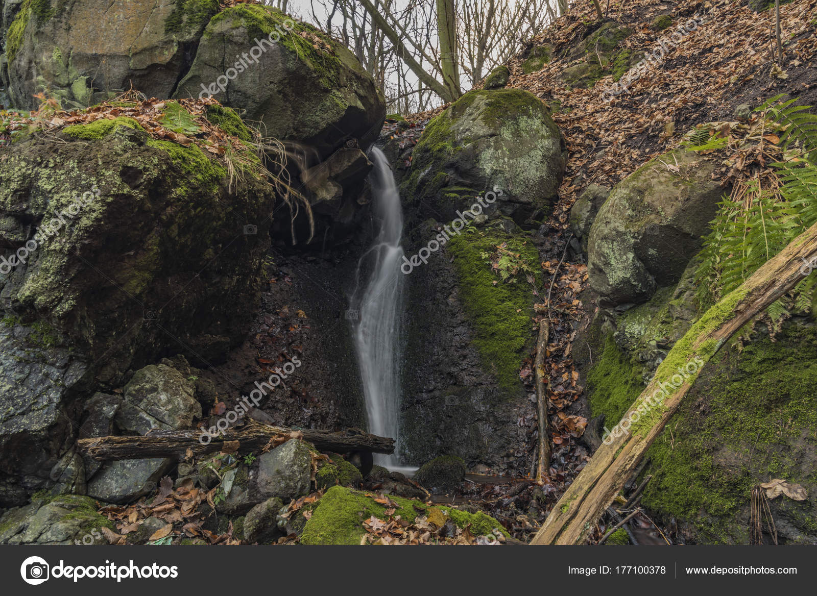 dobeticky waterfall in dark winter forest stock photo laborec425