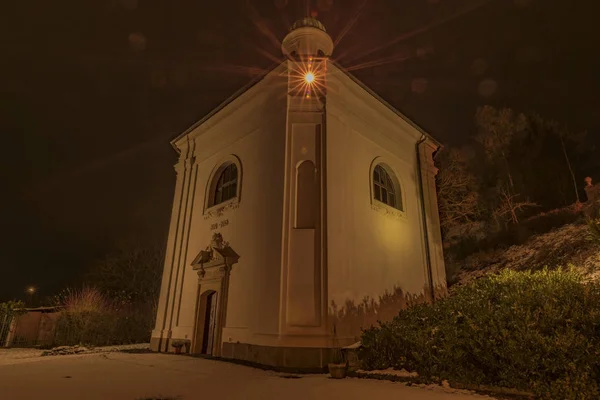 Monastery in night town Ostrov near Karlovy Vary city — Stock Photo, Image