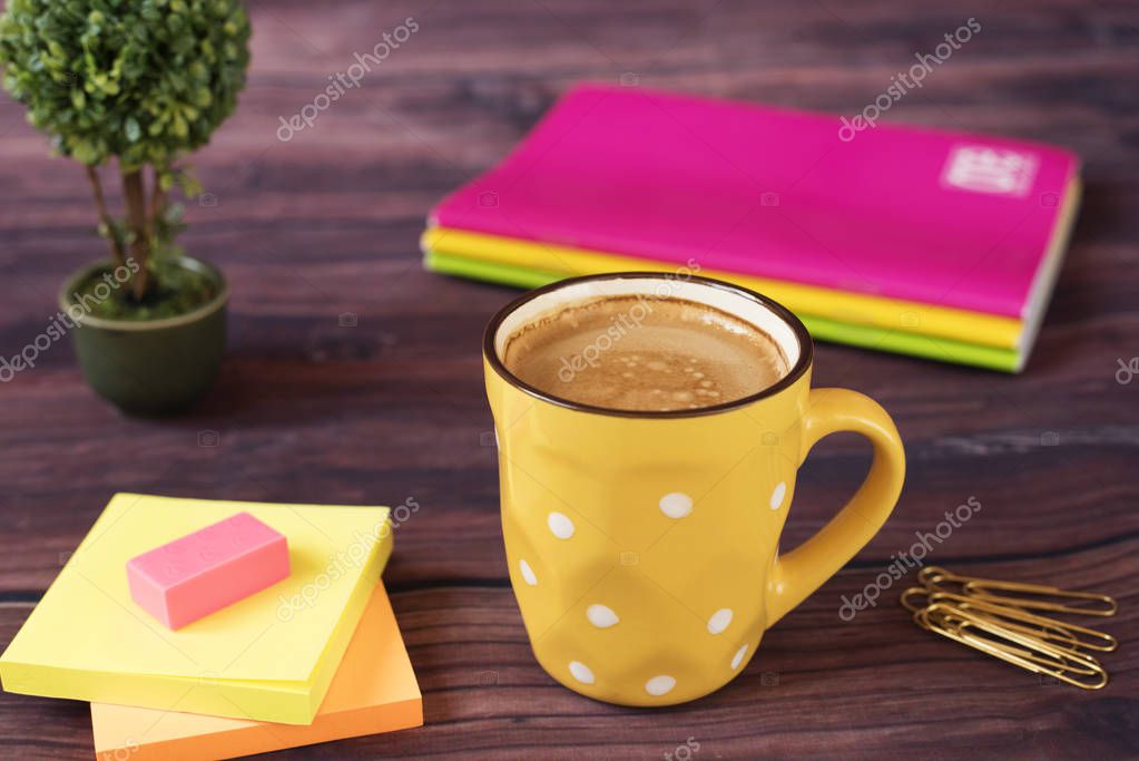 A Cup Of Coffee Yellow White Dots Around Office Desk Yellow Cup Of White Dots Around Office Desk Supplies In Bright Neon Colors Notebooks Gold Pins Stickers And Plant Bonsai Polka Dot Mug