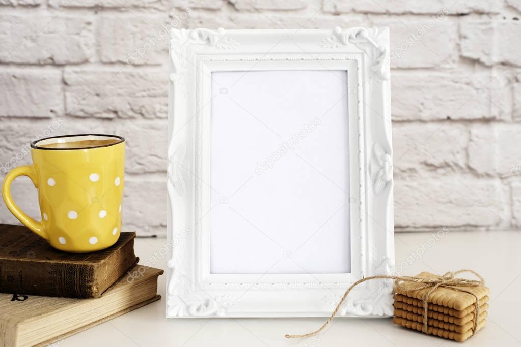 Frame Mockup. White Frame Mock Up. Yellow Cup Of Coffee With White Dots, Cappuccino, Latte, Old Books, Cookies. Display Mock-Up, Styled Stock Photography. Empty Rustic Frame. Gray Brick Wall. Leisure 