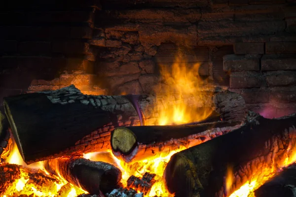 Burning Wood In The Fireplace