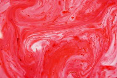 Arka plan olarak kullanmak için akrilik karışımının yakın plan soyut rengi. Mermer desenli akrilik doku, kırmızı mermer arkaplan