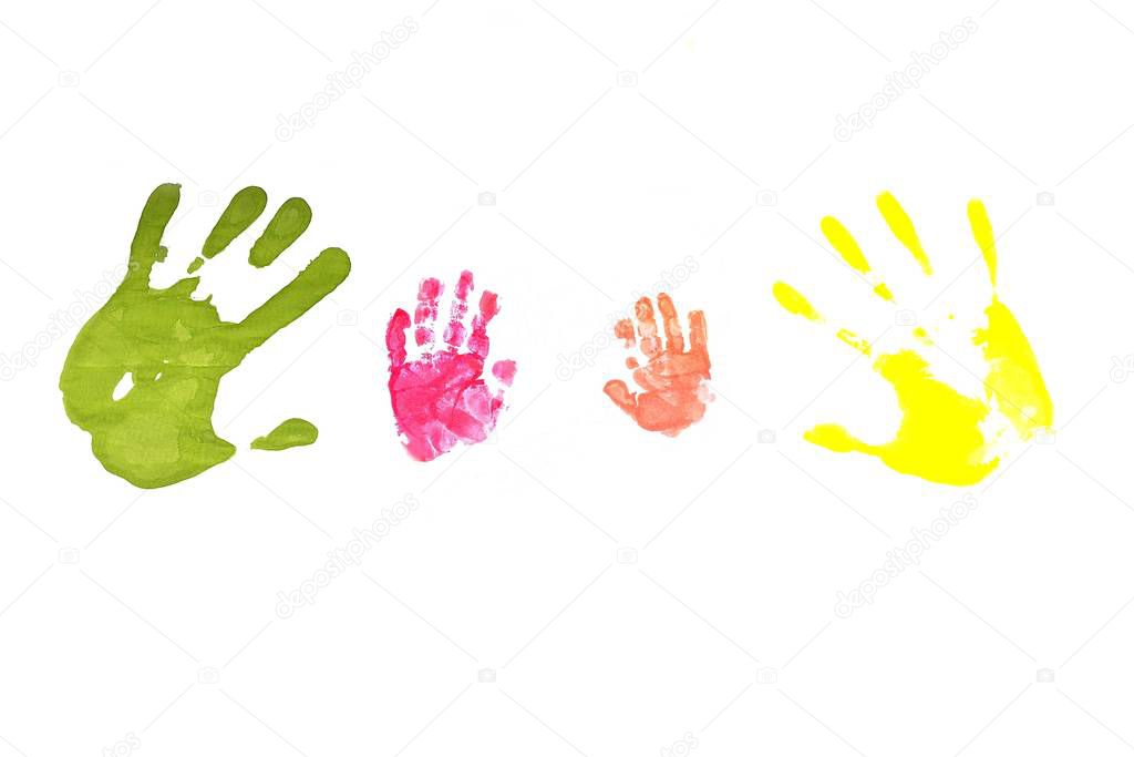 Family. Colored prints of  small children's hands and the hands of  parents.