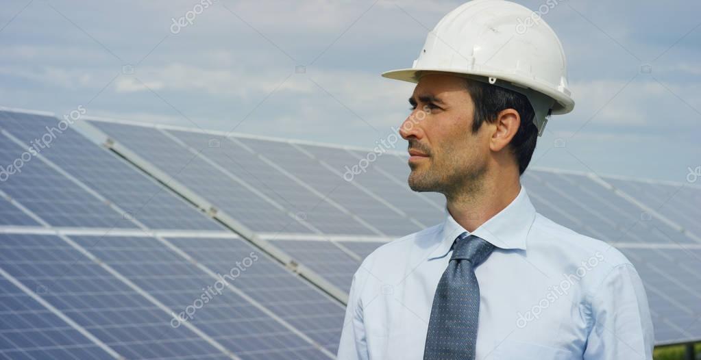 Engineer expert in solar energy photovoltaic panels with remote control
