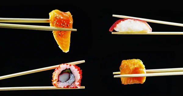 Composición de sushi, sashimi, uramaki y nighiri.typical plato japonés que consiste en arroz, salmón, atún, camarones y huevos de pescado sobre un fondo negro.Concepto: restaurante japonés, sushi, tradición oriental — Foto de Stock