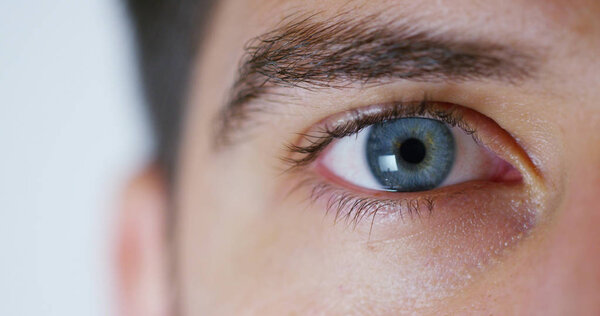 blue eye macro implemented with virtual reality. futuristic vision of reality and concept of cyber technology. Security sistems applied to technology. Concept of web control and remote support.