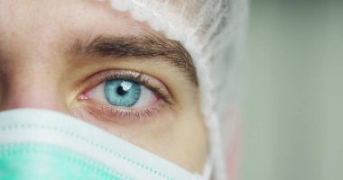 yakın up veya makro bir göz bir doktor, cerrah. tıbbi bakım ve hasta koruma, fütüristik ve teknolojik vizyonu. fütüristik tıp, teknoloji göz, tıbbi Holografi, gelecek