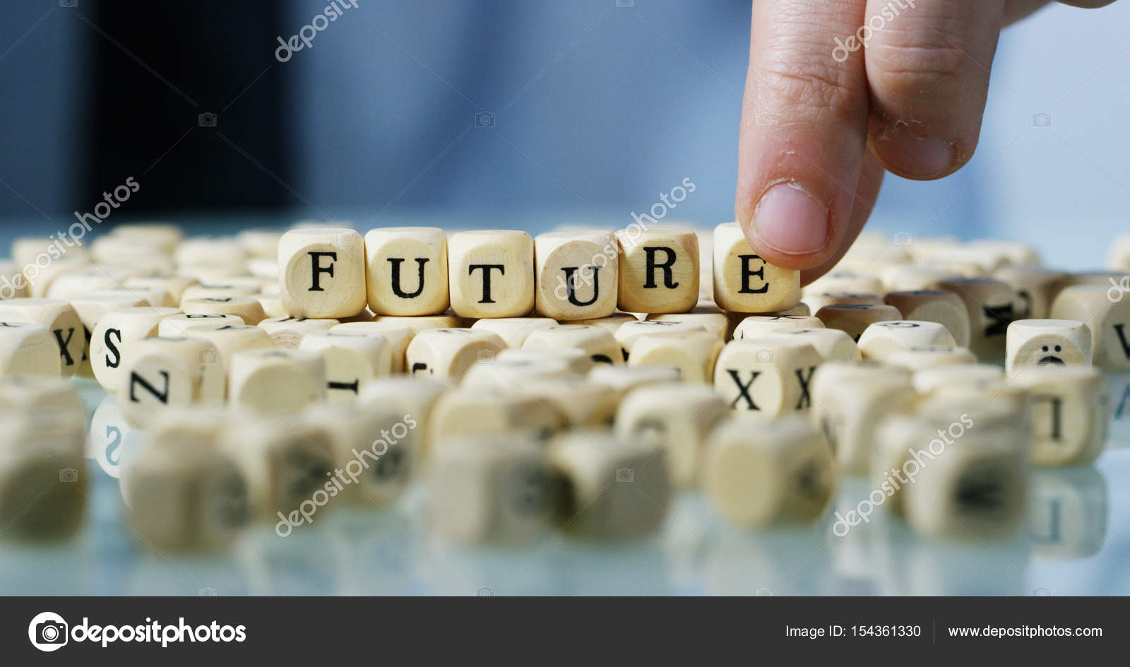 Slow Motion Macro Of The Word "Future" Made Of The Wooden Letter.