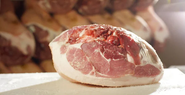 Slow motion salting of parma ham professional and traditional of the history and culture of genuine and healthy food — Stock Image Slow motion salting of parma ham professional and traditional of the history and culture of genuine and healthy food Royalty Free Stock Photos