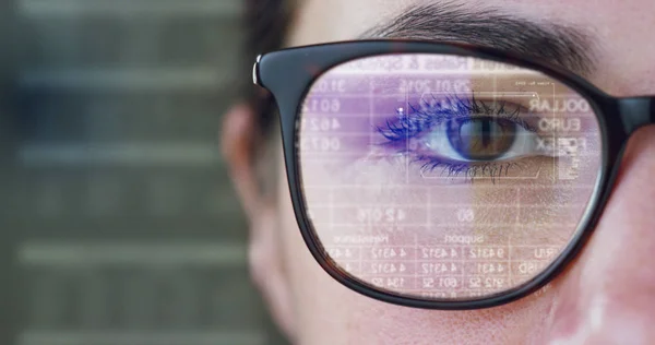 A woman watches with a futuristic look with glasses. augmented reality in holography. — Stock Photo, Image