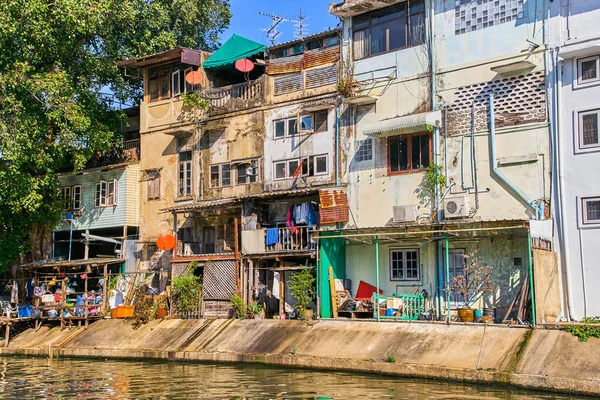 Thai houses along Khlong Rob Krung Canal in Bangkok, Thailand