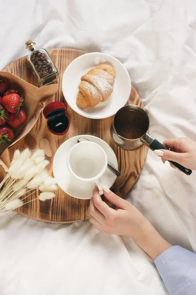 An offer of marriage in time romantic breakfast from coffee with croissant and strawberry. Author processing of image with film effect and copy-space. — 스톡 사진