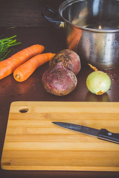 The main ingredients are vegetables for borsch beets, carrots, potatoes, onions . View top. Flat lay. — Stock Photo, Image