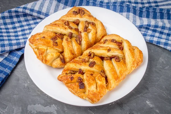 Danish pastry maple pecan with nuts and maple syrup — Stock Photo, Image