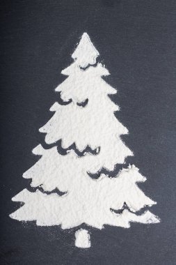 bir Noel ağacı silüeti un gri bir adam üzerinde yapılan