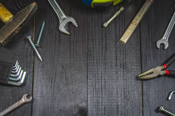Joinery tools on a dark wooden table. Place for the text. A concept for Father's Day. — Stock Photo, Image