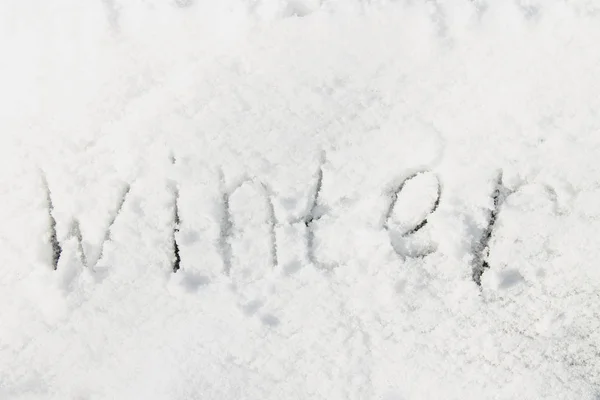 Inscription - vintern i snön. Text, bokstäver. — Stockfoto