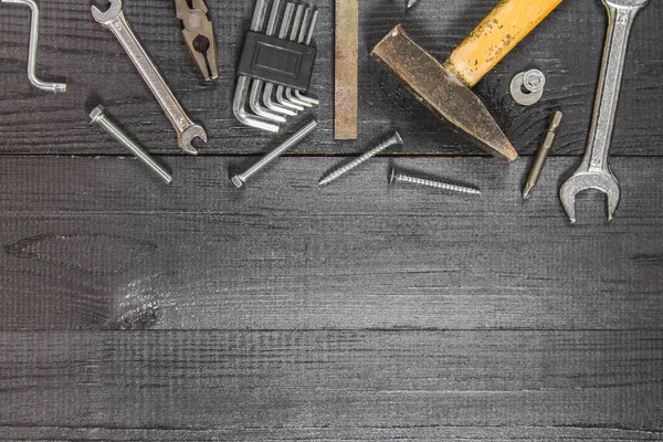 Joinery tools on a dark wooden table. Place for the text. A conc — Stock Photo, Image