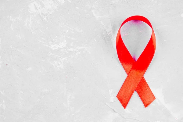 Rött band medvetenhet för World aids Day konceptet. — Stockfoto