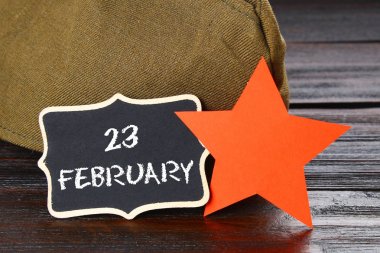 Kara tahta metin ile: 23 Şubat. Anavatan gün savunucusu.