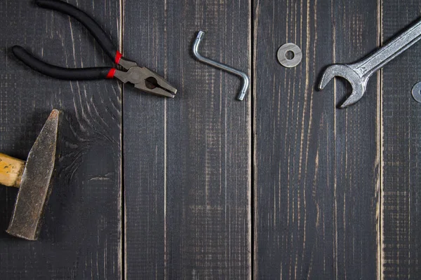 Joinery tools on a dark wooden table. Place for the text. A conc — Stock Photo, Image