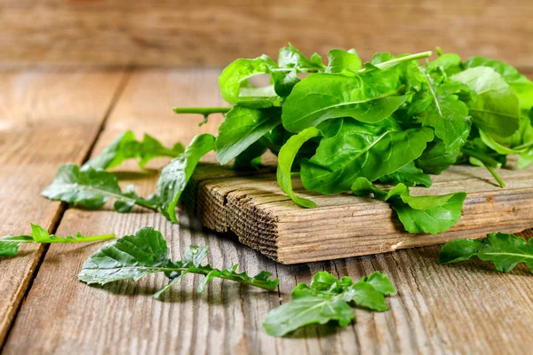 Fresh green home arugula leaves, rucola. Salad.