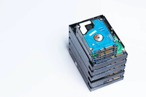 Stack of old hard drives on white background — Stock Photo, Image