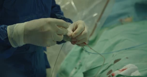 Surgeons preforming cardiac catheterization — Stock Video