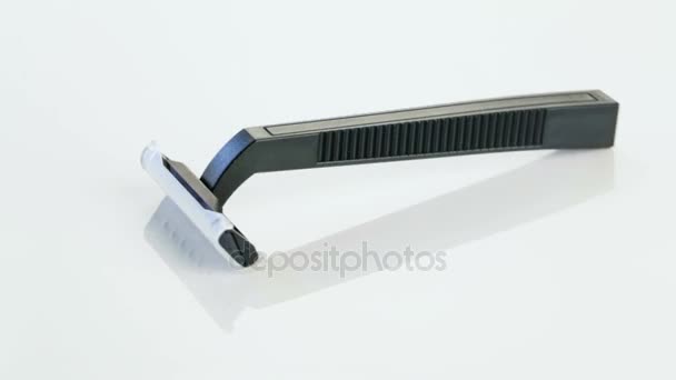 Shaving razor on white background — Stock Video