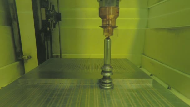 Precision cutting of metal parts using an Electrical discharge machine — Stock Video