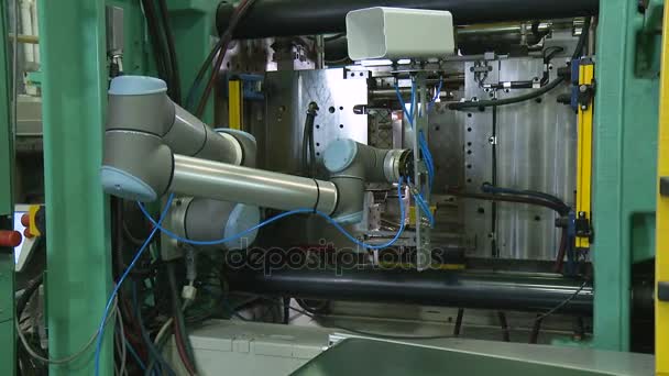 Automated production of plastic parts in a large factory — Stock Video