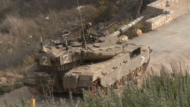 Israel, Circa 2011 - IDF tank driving next to the lebanon border — Stock Video