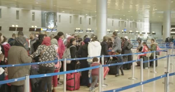 Tel Aviv, Israel - January 2018. Passengers walking through airport terminal — Stock Video