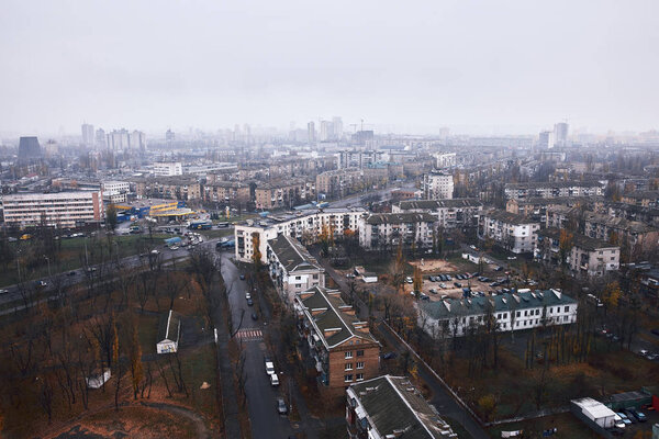 Aerial view of residential district in a foggy day.View over the city rooftops.Moderns buildings at Industrial uptown,residential neighbourhood