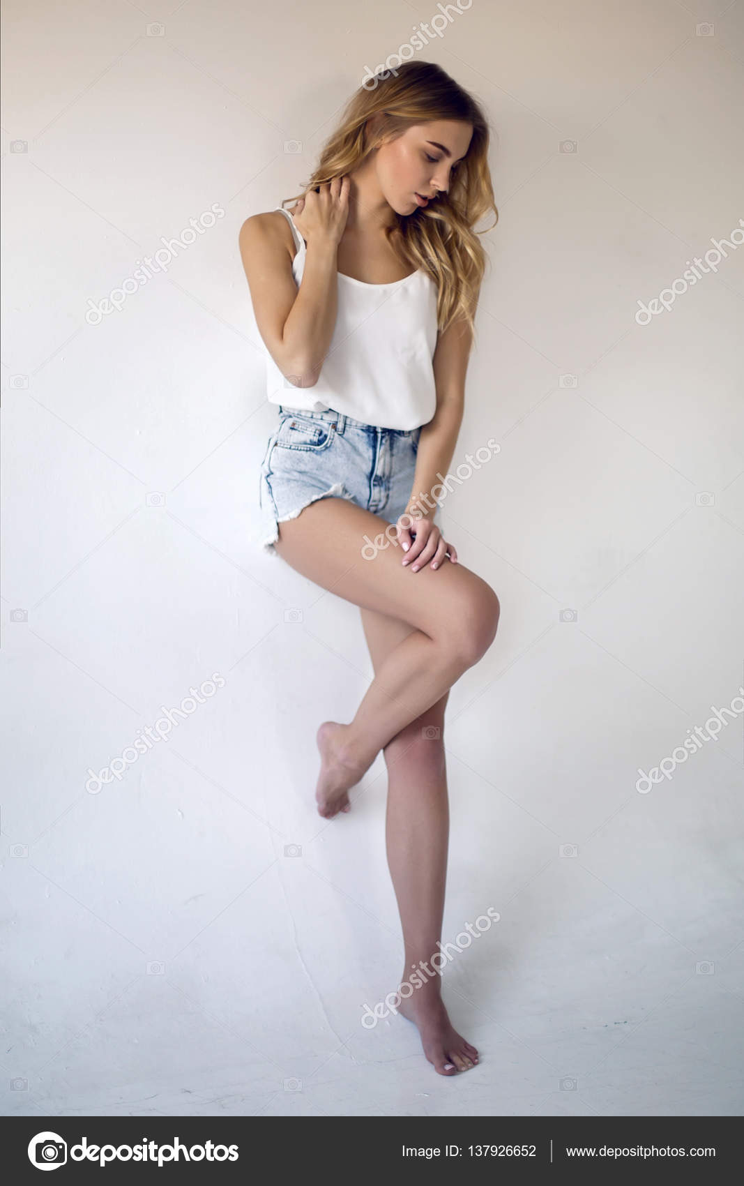 girl wearing jean shorts